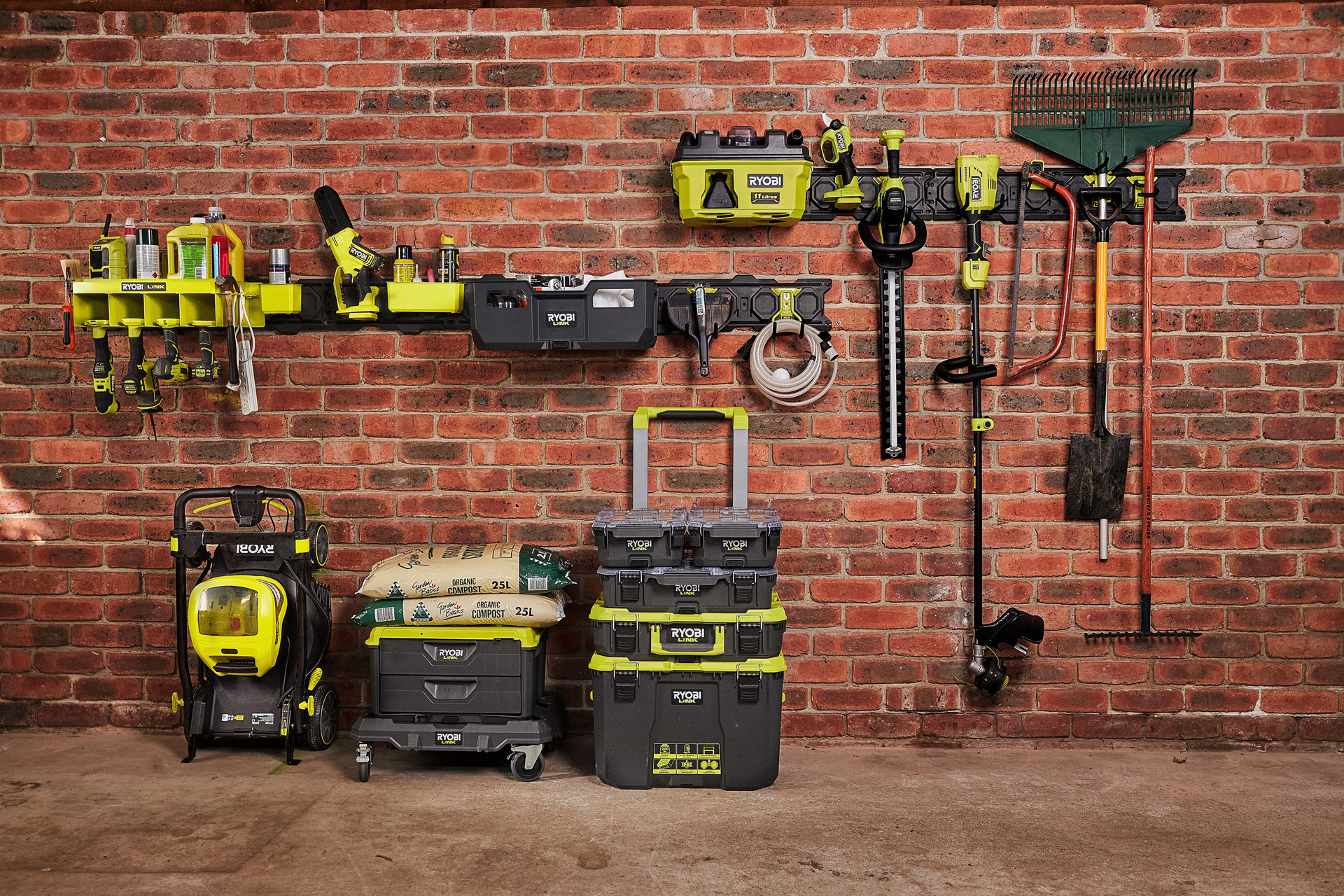 RYOBI LINK storage installed on a brick wall.