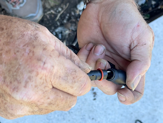 A plug and play connector to switch on garden lights