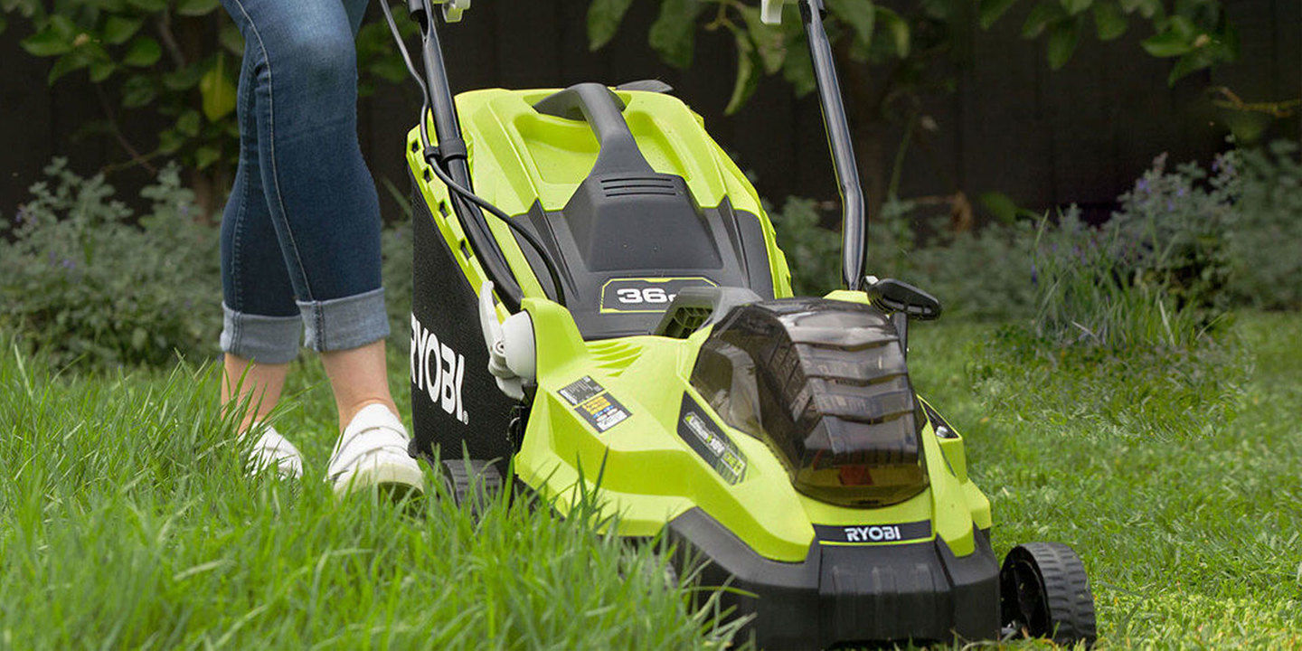 Ryobi lawn mower cutting a long lawn