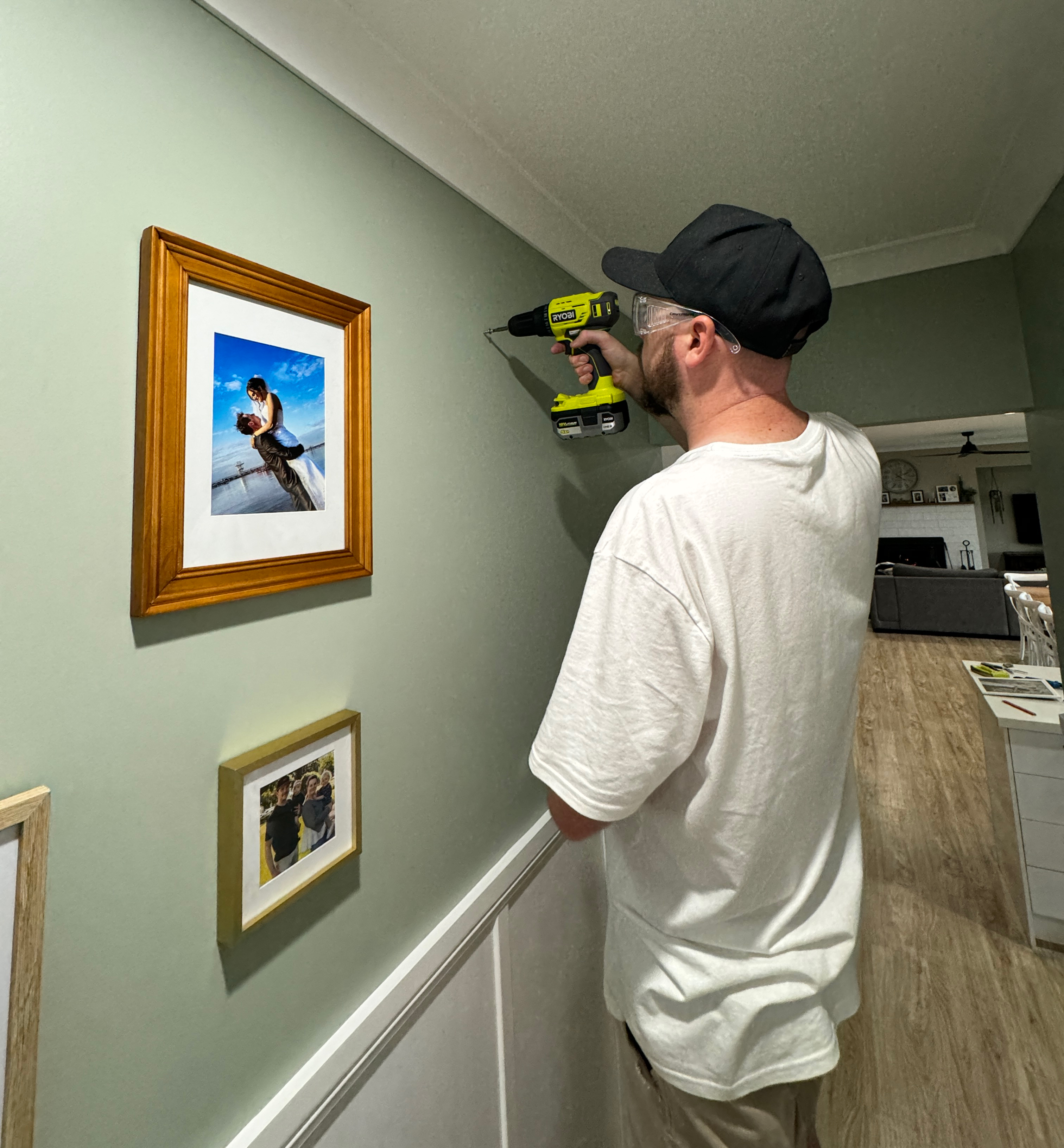 Using a RYOBI Drill/Driver to hang photo frames