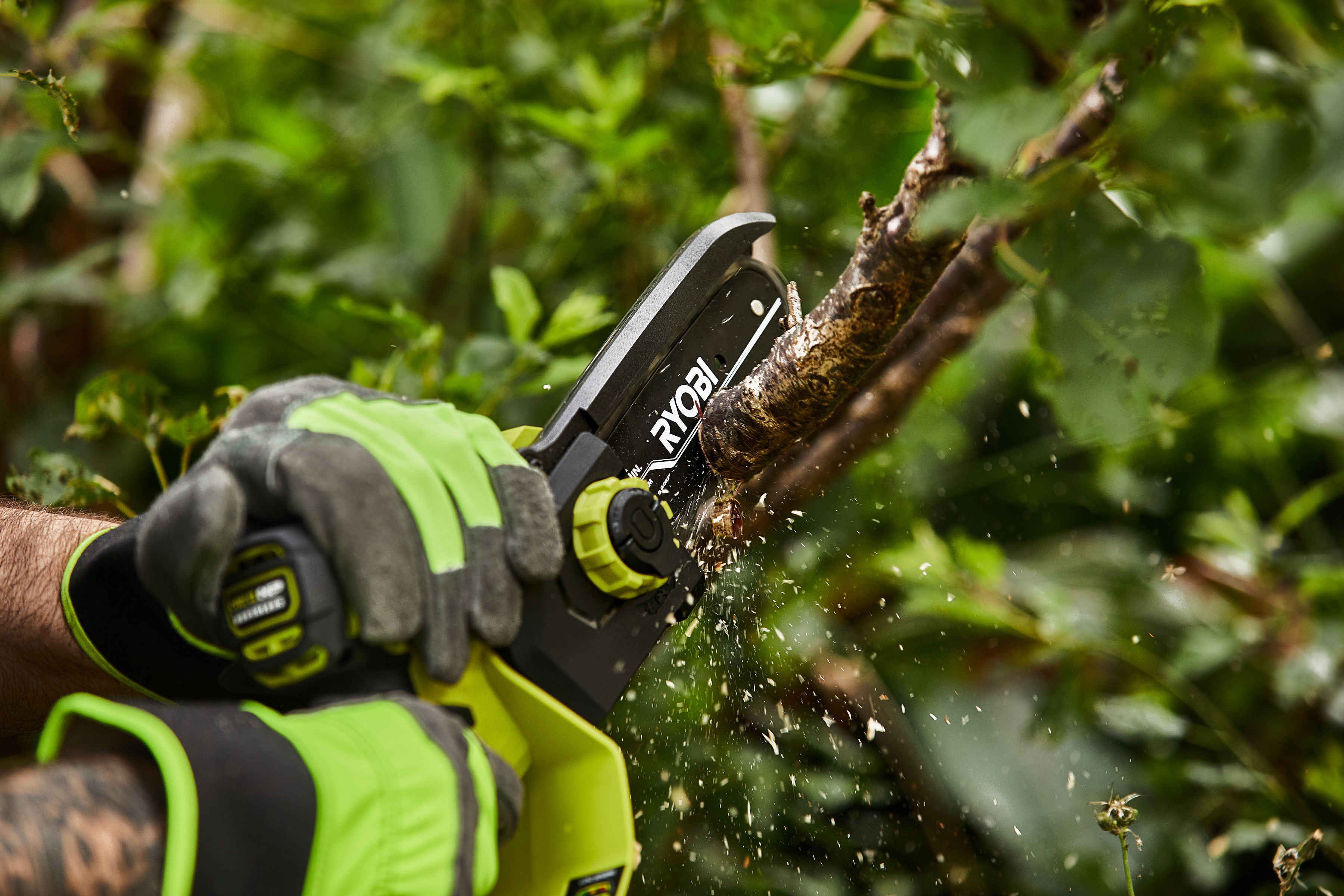 RYOBI Pruning Saw cutting branch