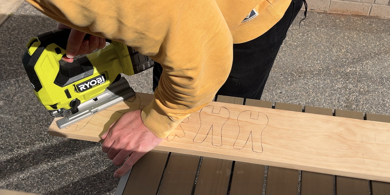 Using a RYOBI jigsaw to cut wooden reindeer decorations